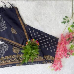 Midnight navy blue saree with golden block printed motifs and an antique gold zari border.