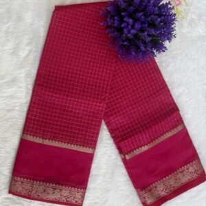 Deep magenta pink saree featuring a fine gold grid check pattern and an ornate woven floral zari border.