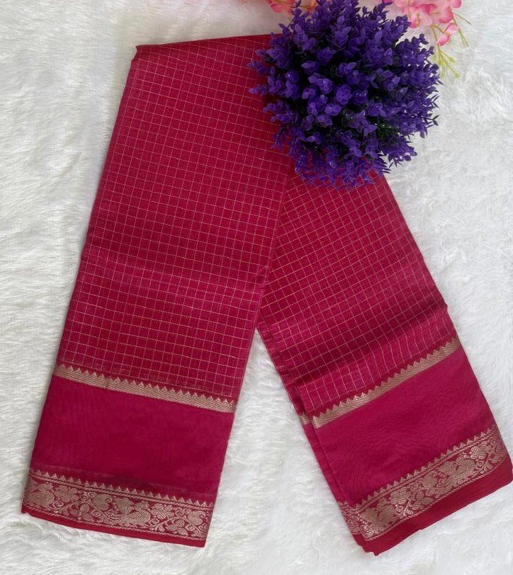 Deep magenta pink saree featuring a fine gold grid check pattern and an ornate woven floral zari border.