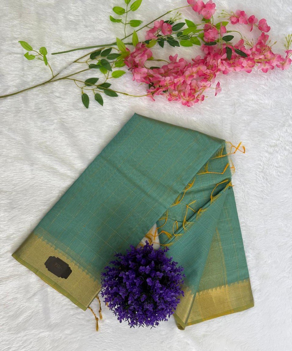 Sea green saree with an all-over fine gold woven check pattern and a gold zari border.